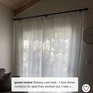 Pair of Threshold 100 percent linen curtains.